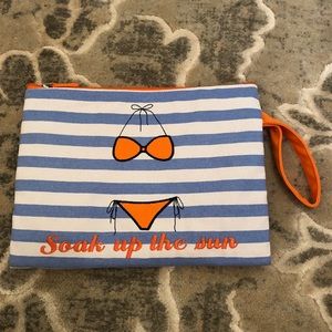 Beachy striped clutch